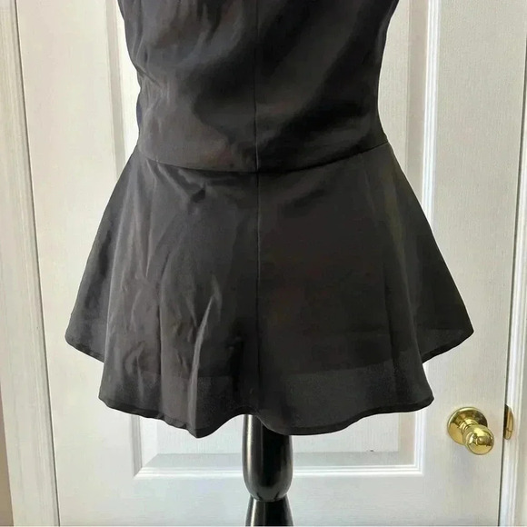 Ricki’s Blouse Sleeveless Peplum Halter Neckline Flowy Top Black Size 0/XS NWT - Picture 8 of 14